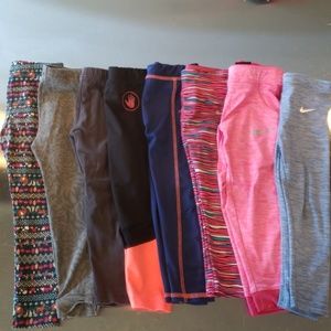 8 pairs of leggings and one top